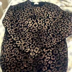 Women’s black and gold cheetah print sweater